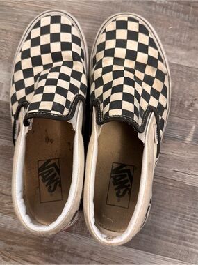 Well worn Vans Checkerboard Slip-On Sneakers - Black and White